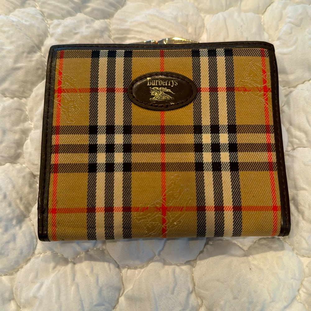 Burberrys compact Kiss-lock wallet, coin kiss lock area. Cards & Bills slots.